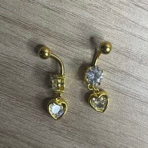 Hearta - Banane dorée avec 1 cristal et un cœur serti de cristaux pendant